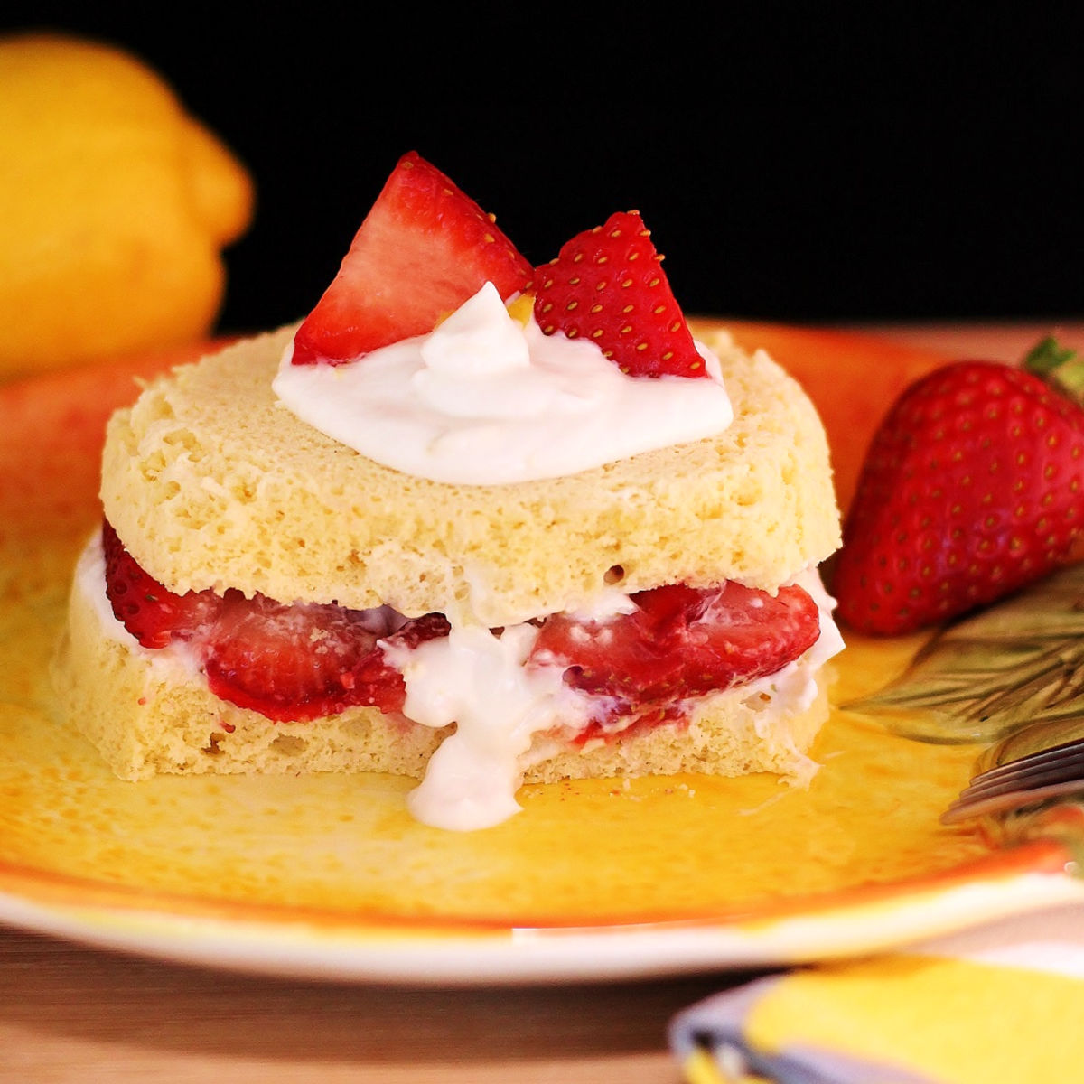 A quick & simple strawberry lemon shortcake with cream & berries.