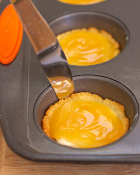 Use knife to loosen tart from pan.