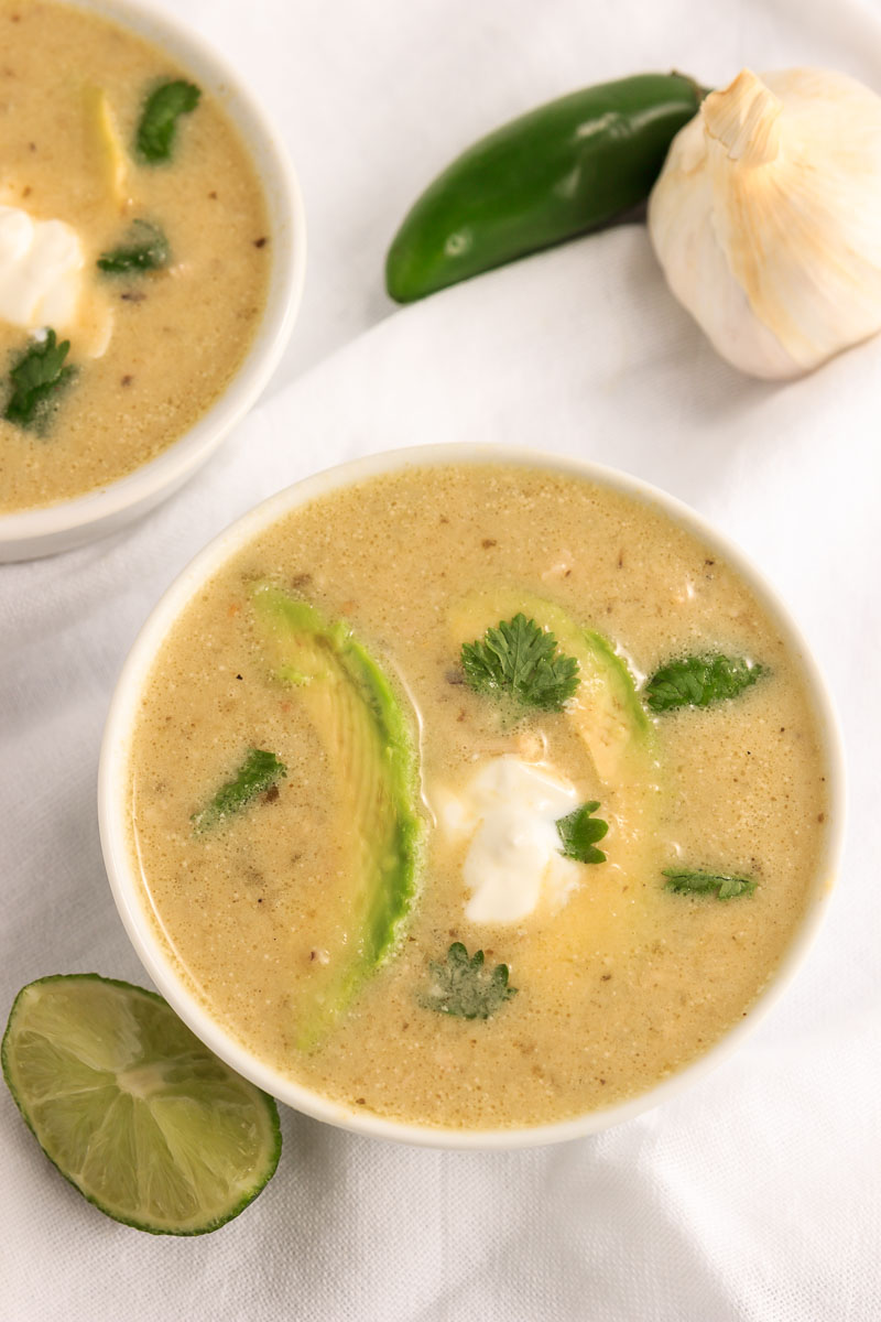 Two bowls of Instant Pot Creamy Chile Verde Chicken Soup