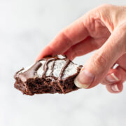 A keto brownie with a bite taken out of it.