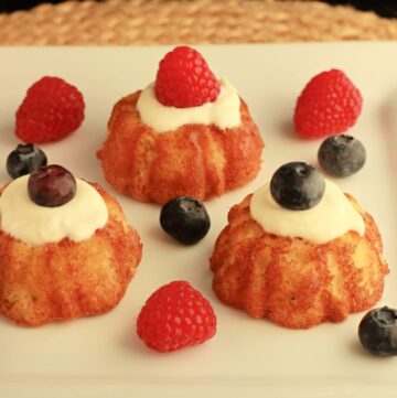 Mini vanilla bundt cakes with whipped cream & berries